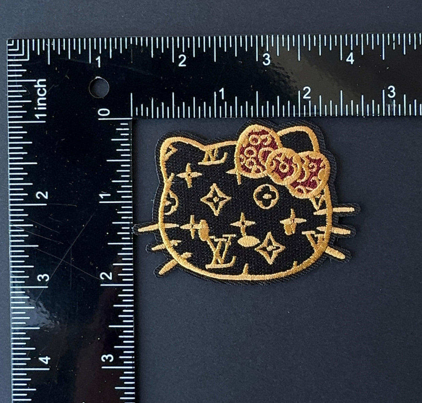 L. Brown Kitty Iron-on Patch