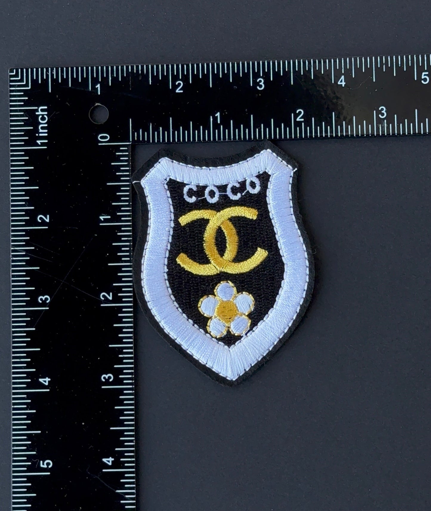 Coco C.C iron on Badge