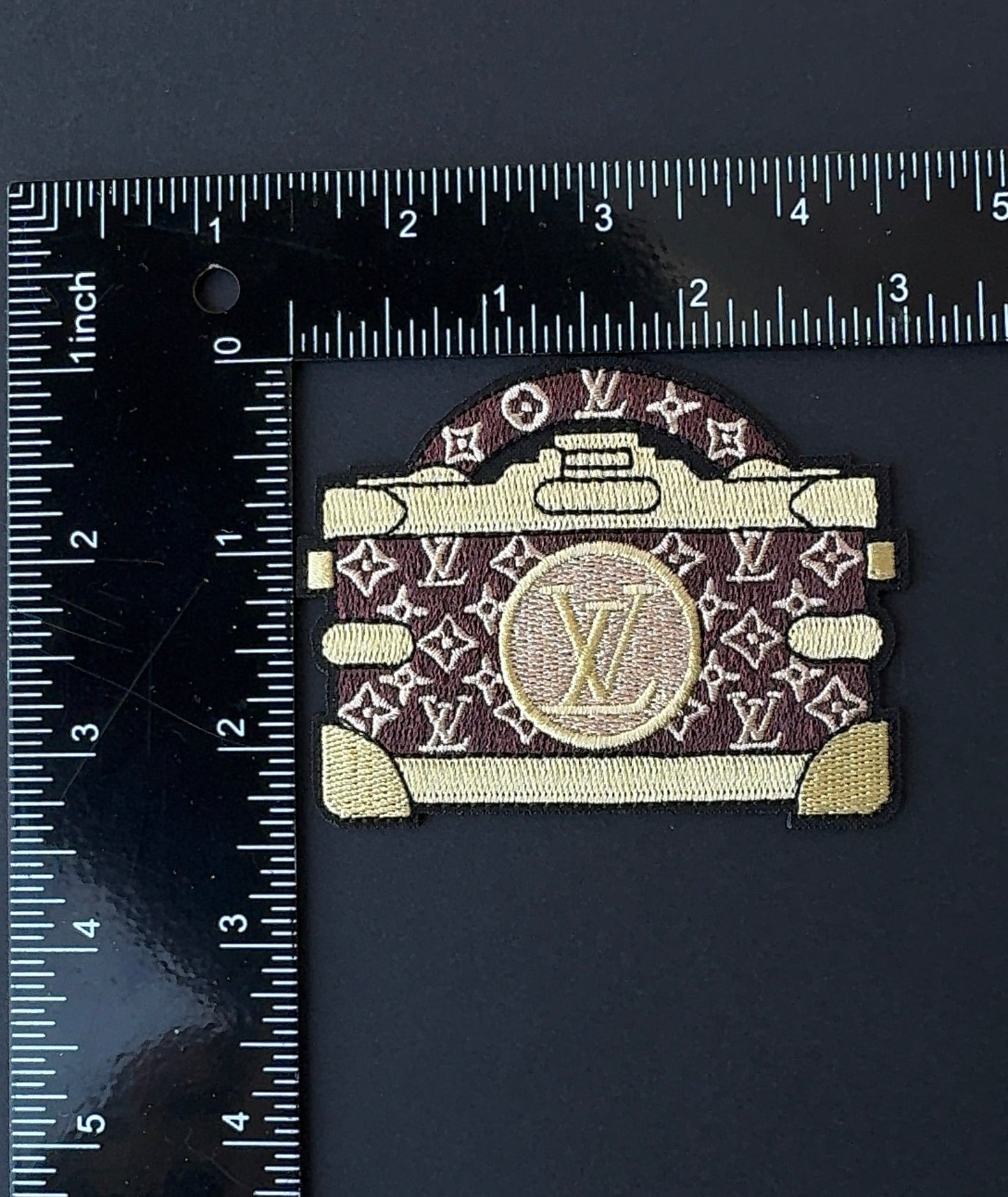 Iron on L Trunk patch