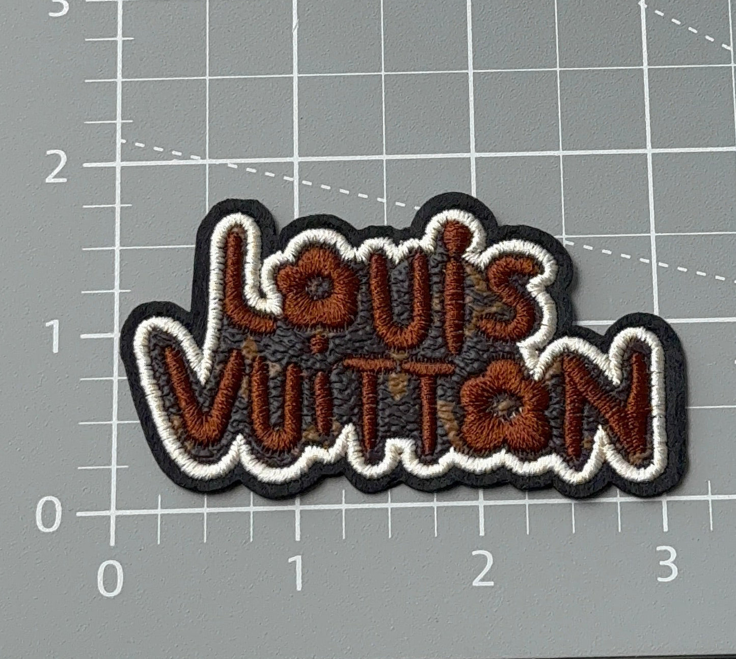 L Brown patch