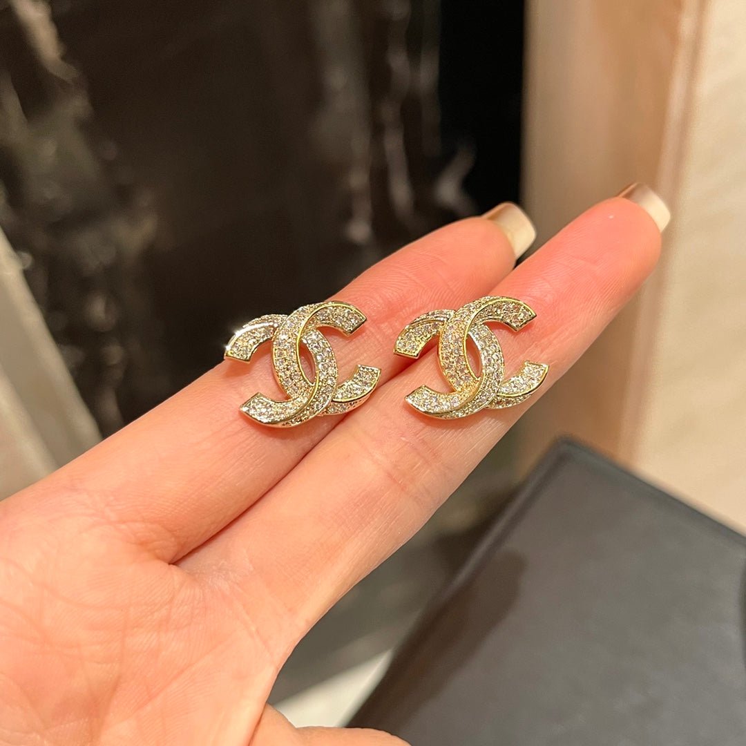 C.C Detailed diamond earrings