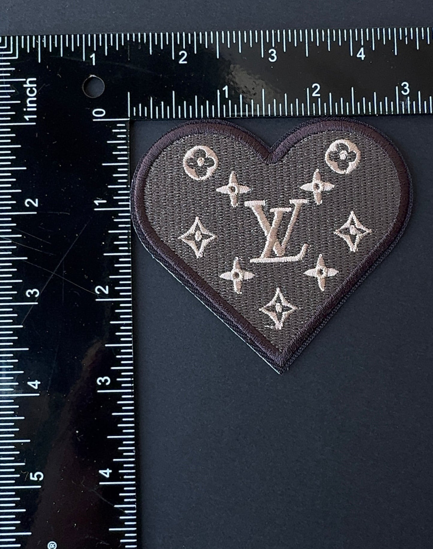 Iron on L. Heart patch