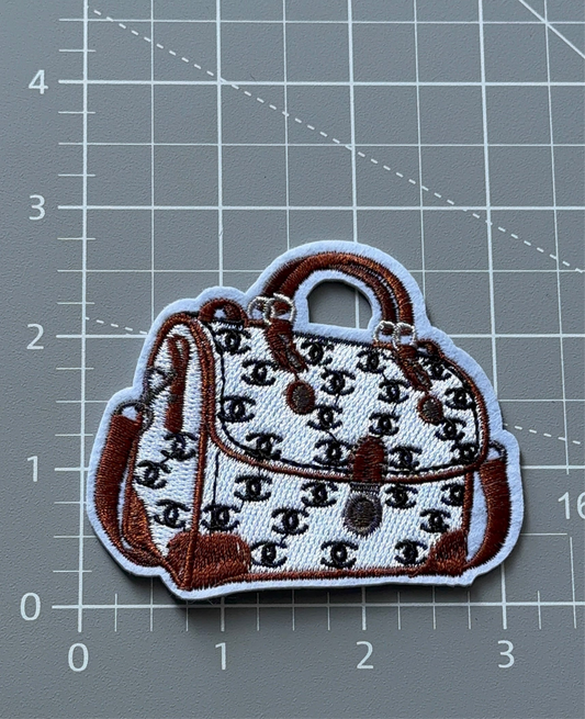 C. C White and brown bag patch