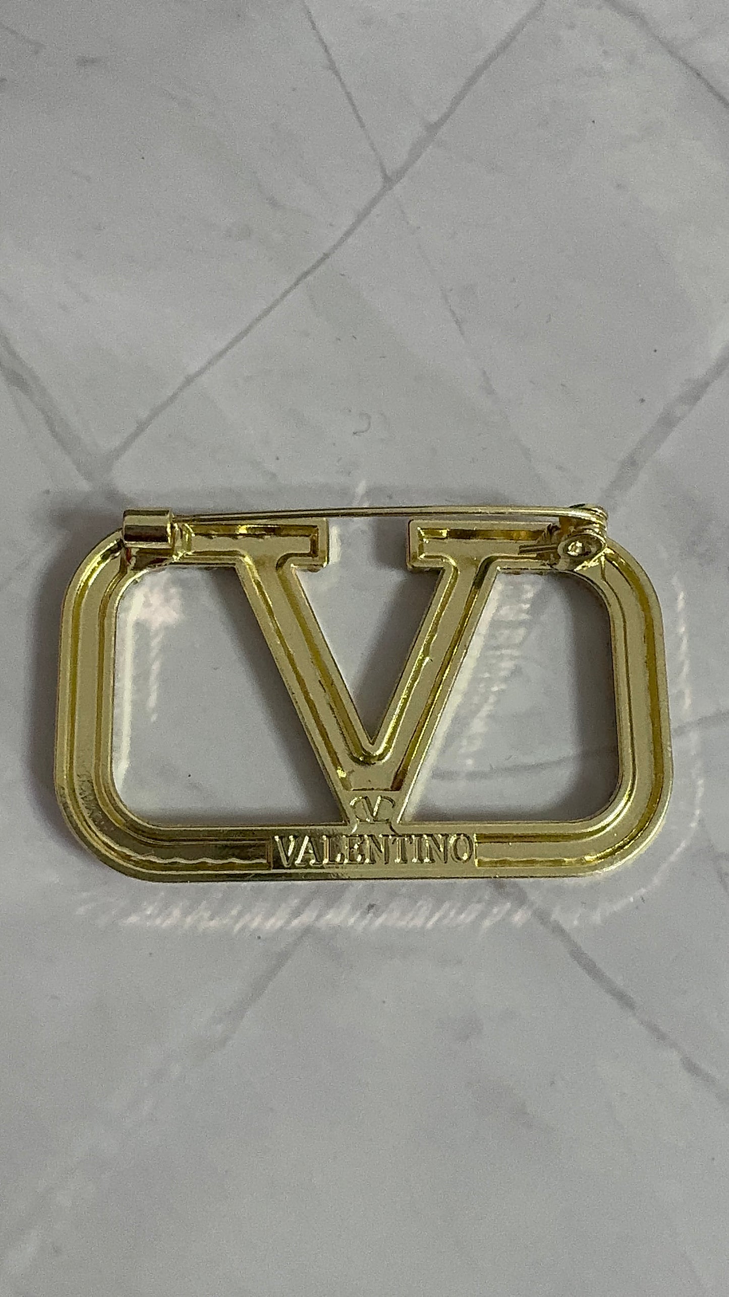 V.  Brooch Pin