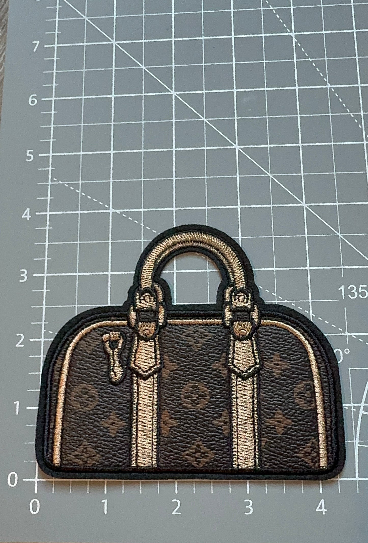 LV duffle Bag patch