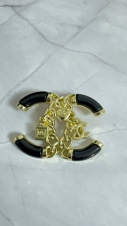 Black & Gold C.C Brooch