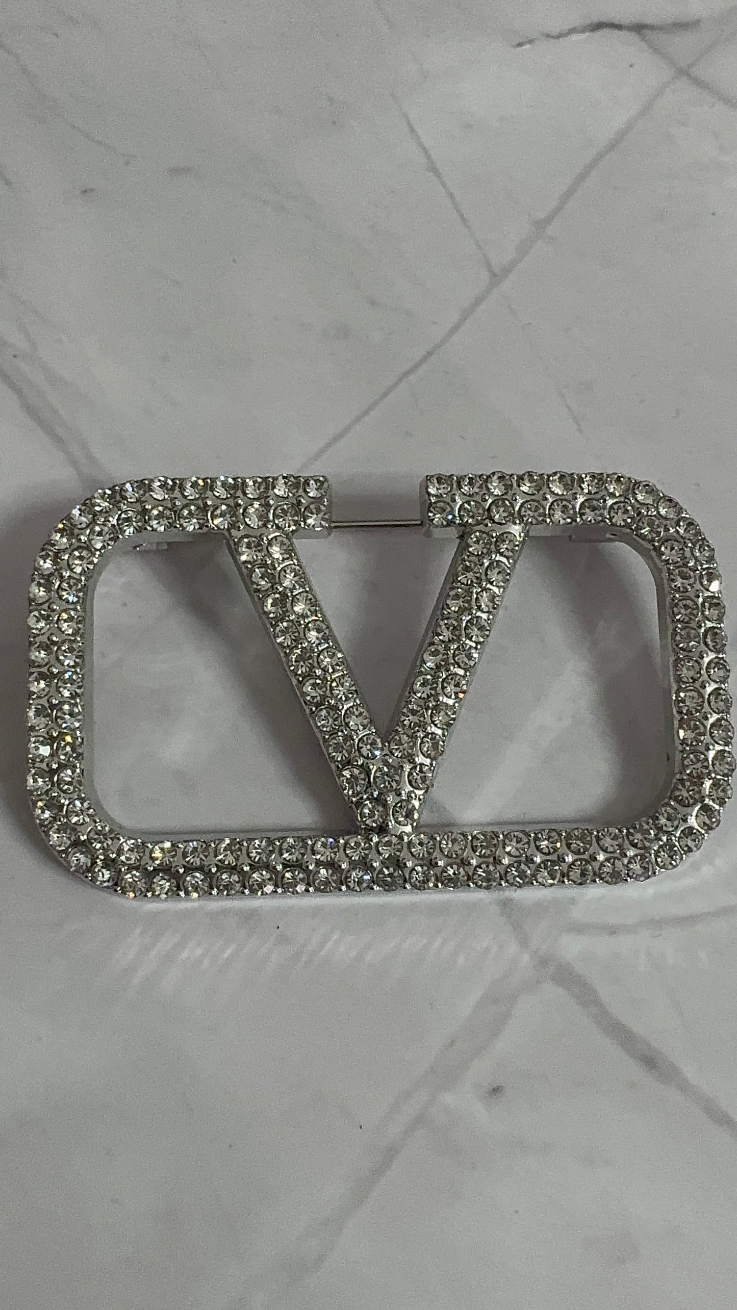 V.  Brooch Pin