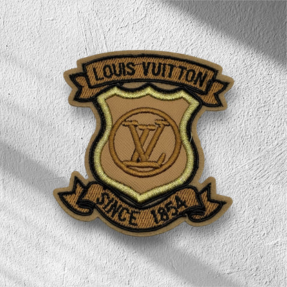 Brown L Logo Patch