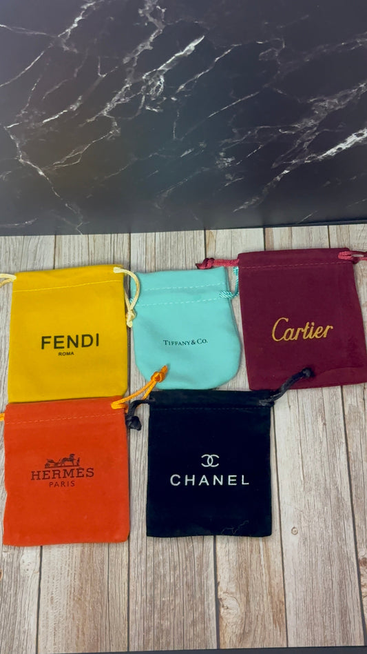 Designer inspired pouch bags
