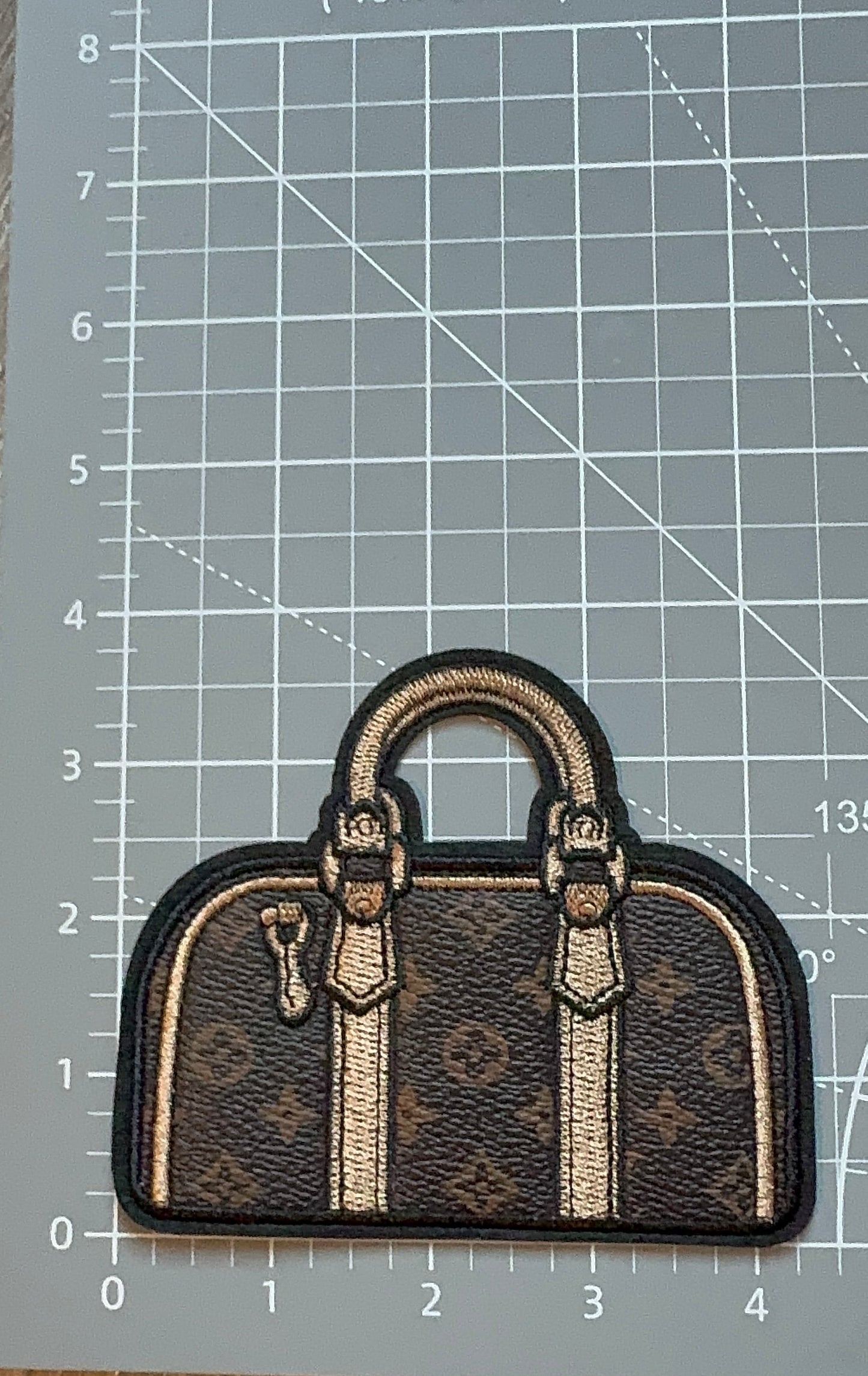 LV duffle Bag patch