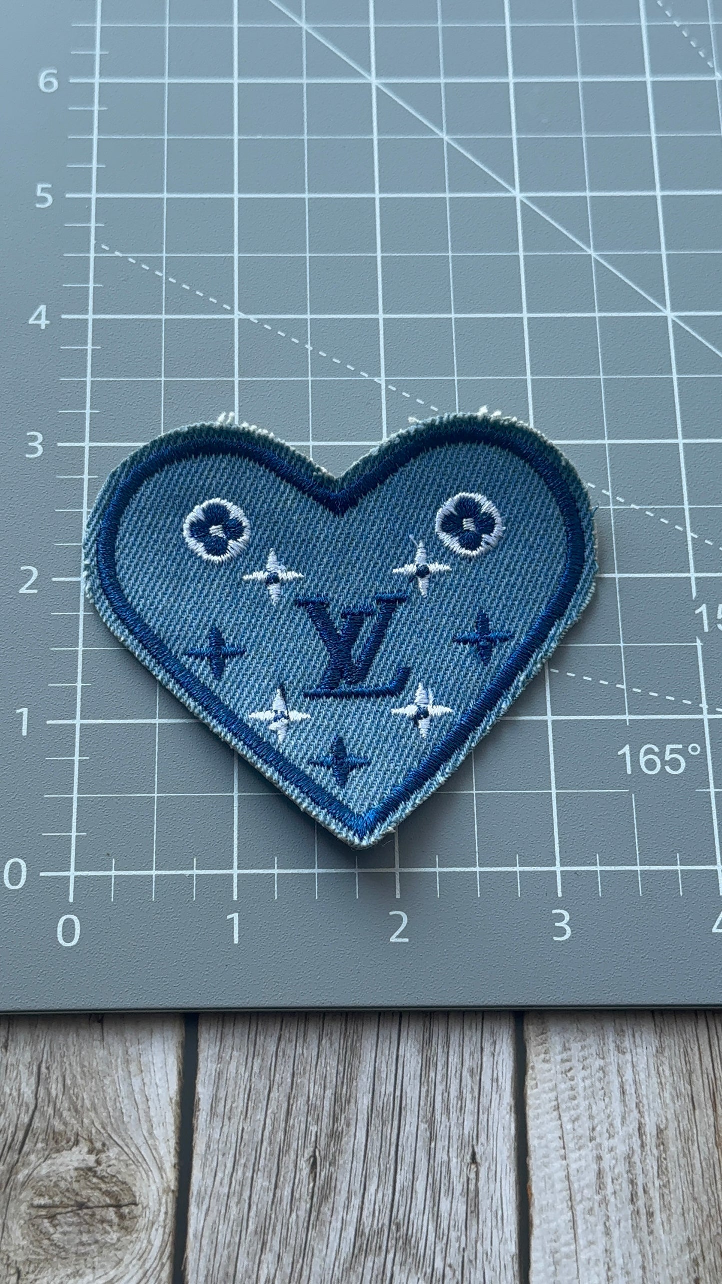 L. Denim logo patch