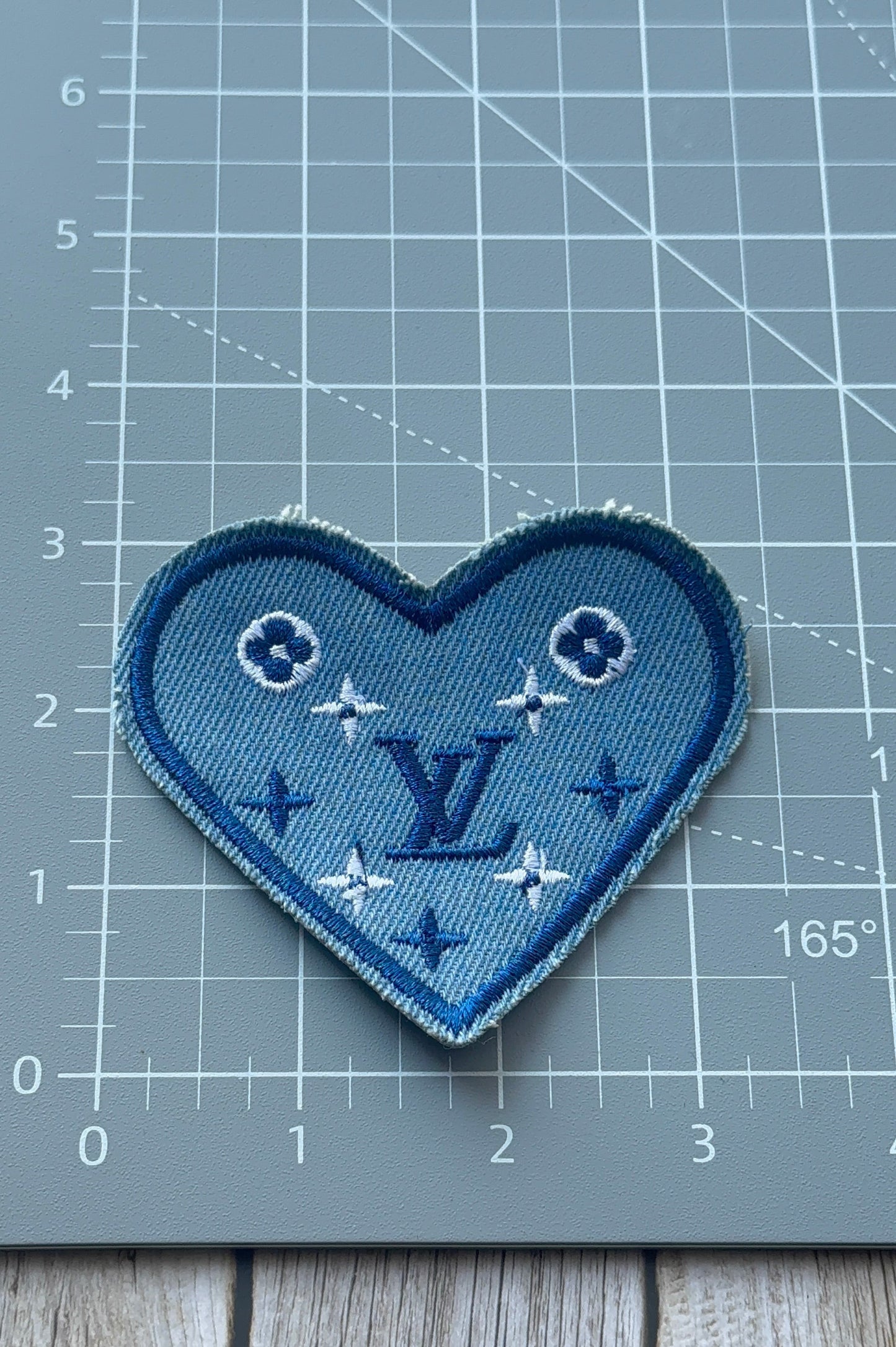 L. Denim logo patch