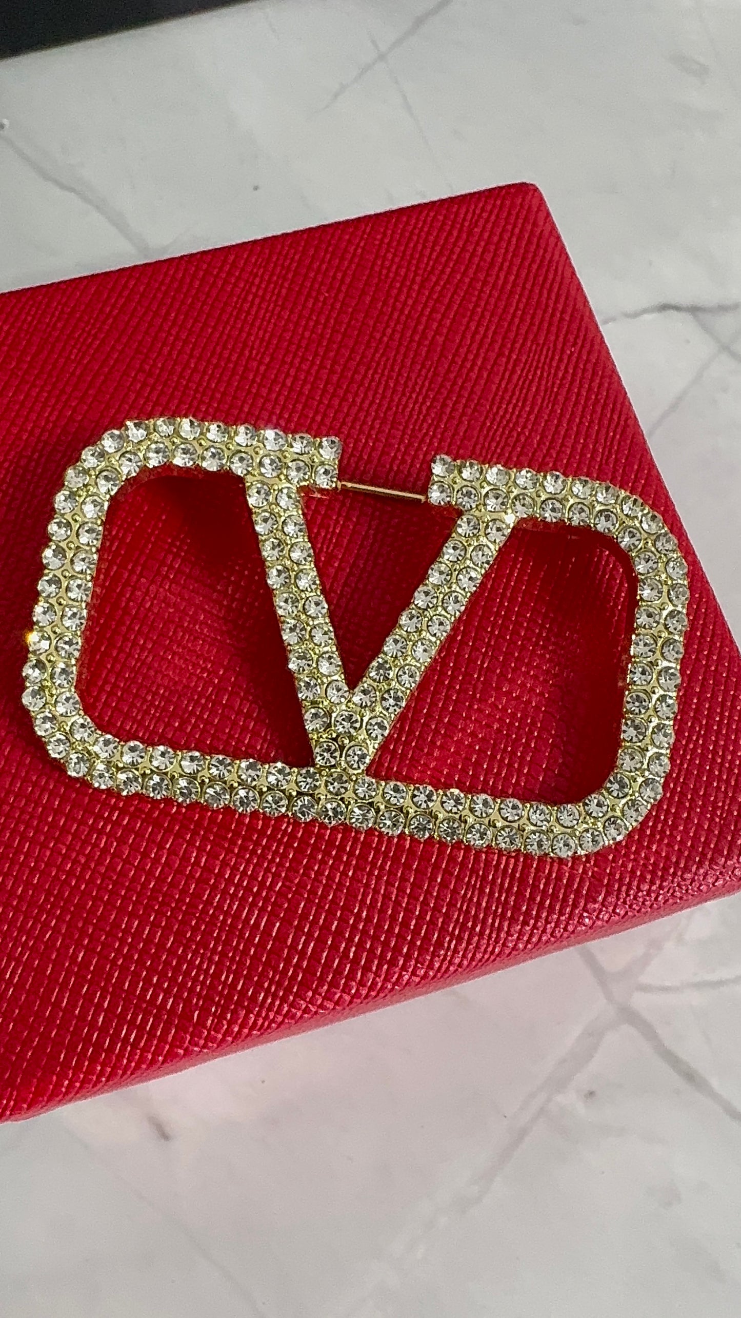 V.  Brooch Pin
