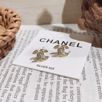 C.C Detailed diamond earrings