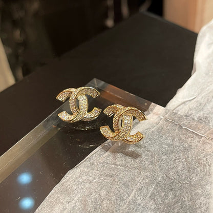 C.C Detailed diamond earrings