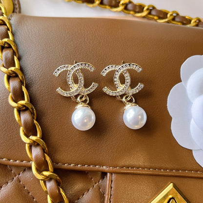 C.C Brand round pearl earrings with zirconia