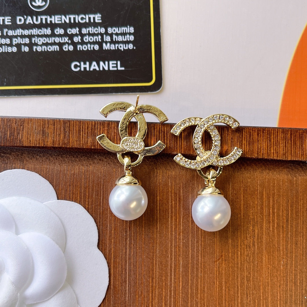 C.C Brand round pearl earrings with zirconia