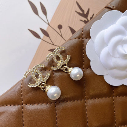 C.C Brand round pearl earrings with zirconia