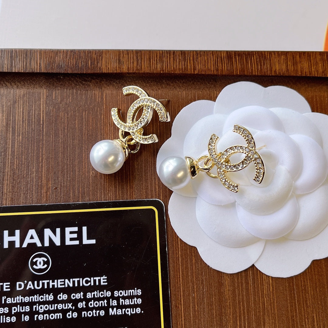 C.C Brand round pearl earrings with zirconia