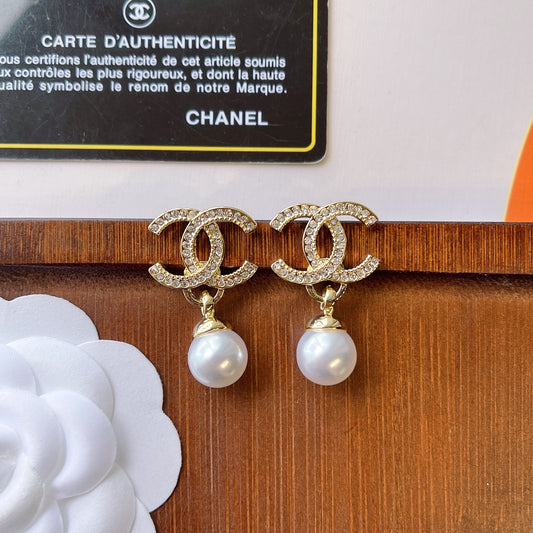 C.C Brand round pearl earrings with zirconia