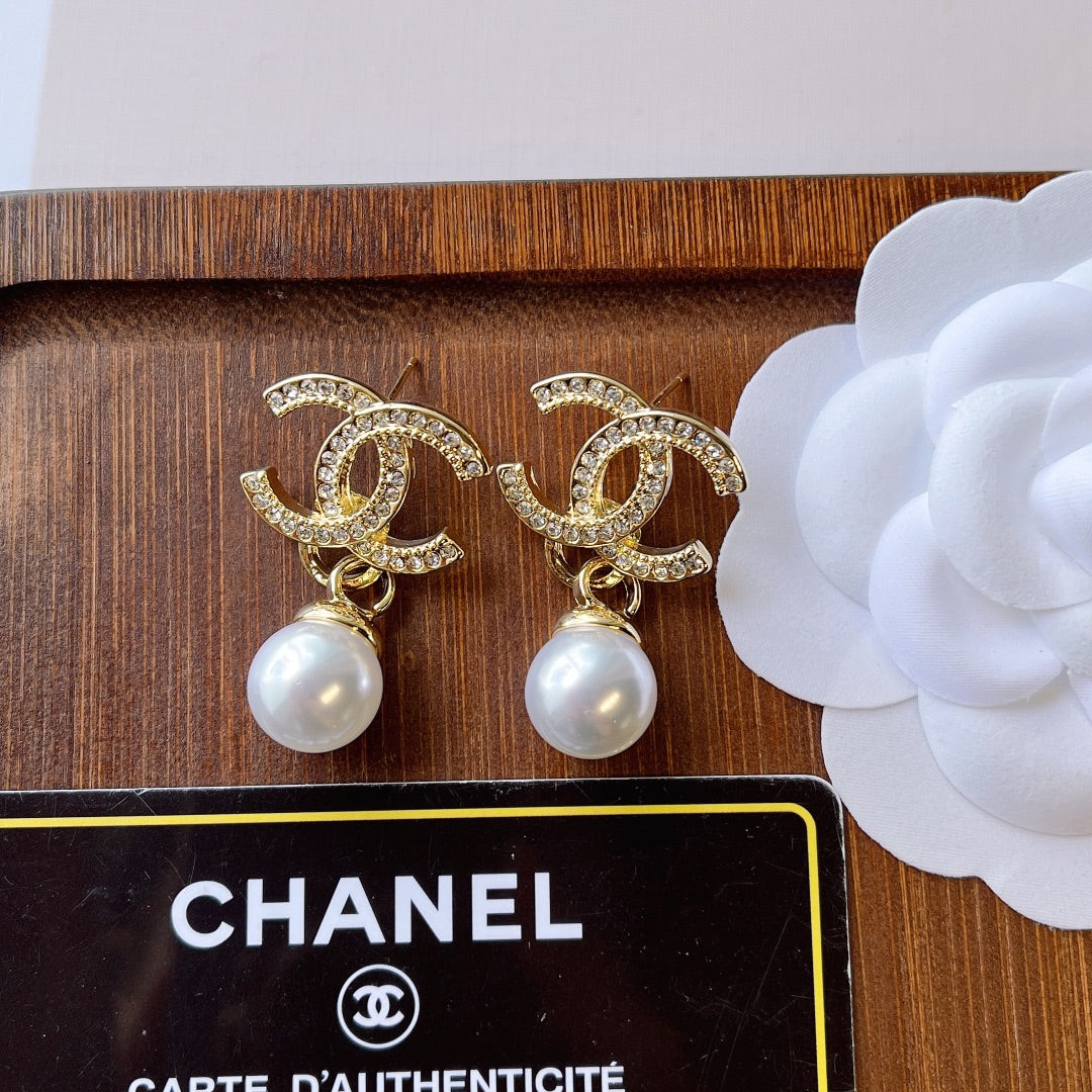 C.C Brand round pearl earrings with zirconia