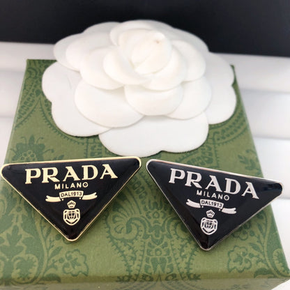 Luxury Prada Black/Gold Brooch pin