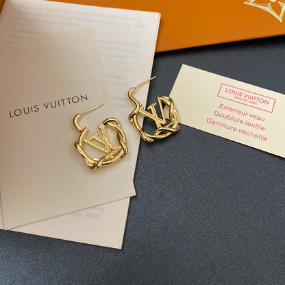 L.V Inspired  Twist Gold plated Earrings