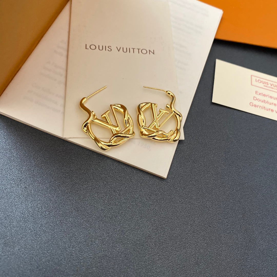 L.V Inspired  Twist Gold plated Earrings